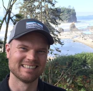 Photograph of me standing on the Washington coast.